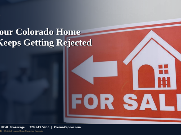 Couple reviewing home offer documents with their real estate agent