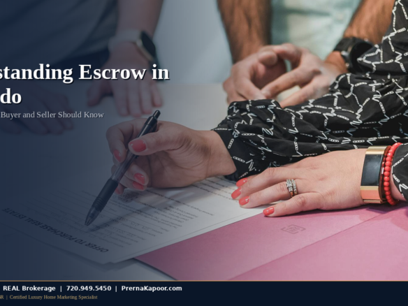 Real estate closing document signing at a title company in Colorado