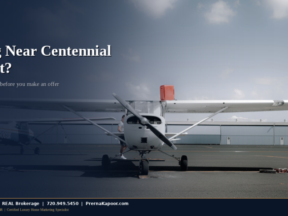Small aircraft parked on the apron of a general aviation airport, illustrating buying a home near Centennial Airport in Colorado